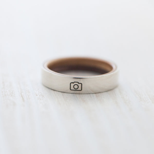 Camera engraving on silver & wooden skateboard ring - BoardThing