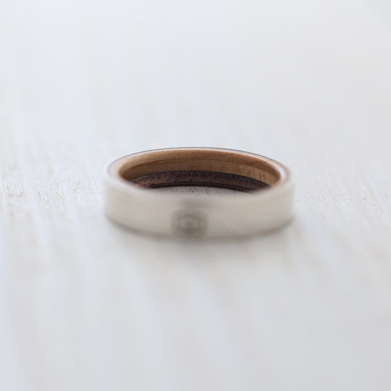 Camera engraving on silver & wooden skateboard ring - BoardThing