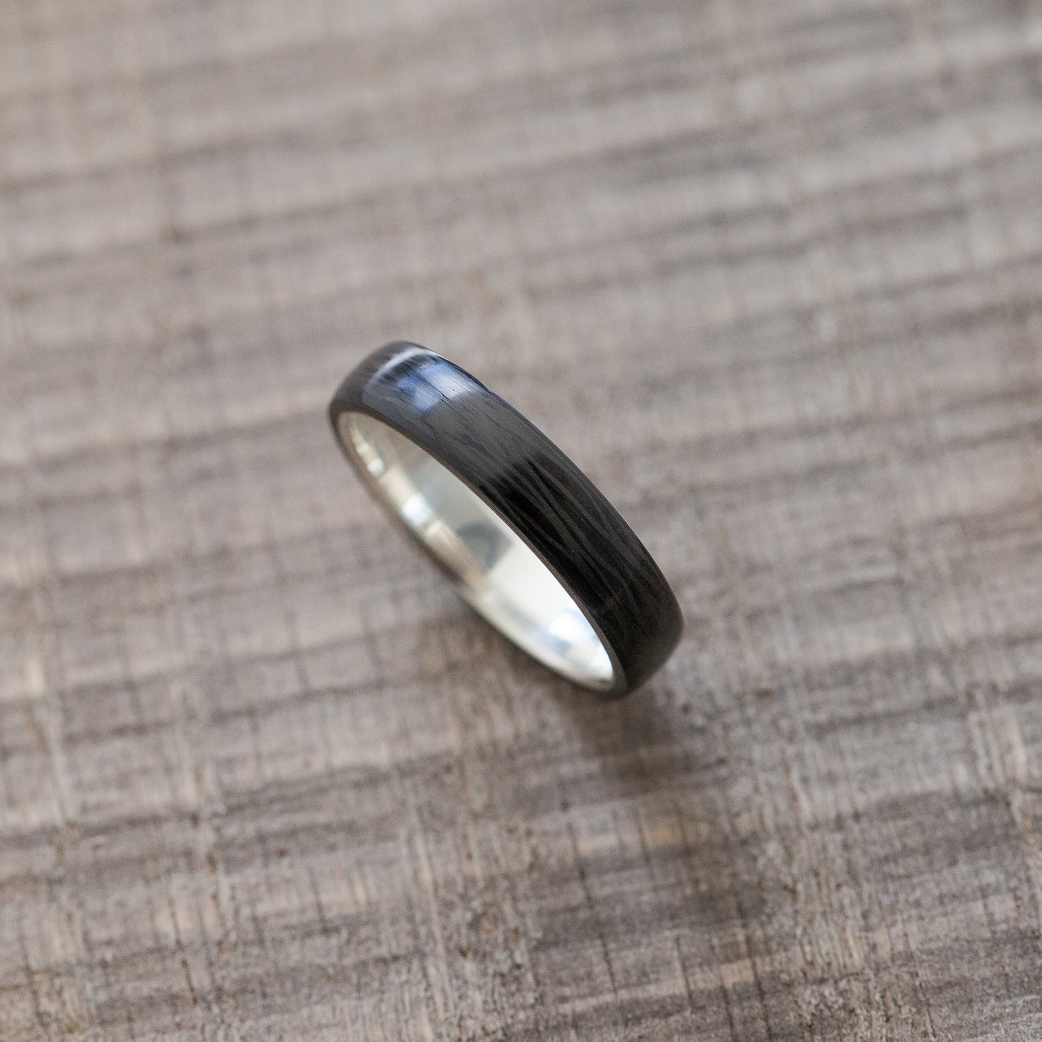 Black Carbon Ring with silver band inside - BoardThing