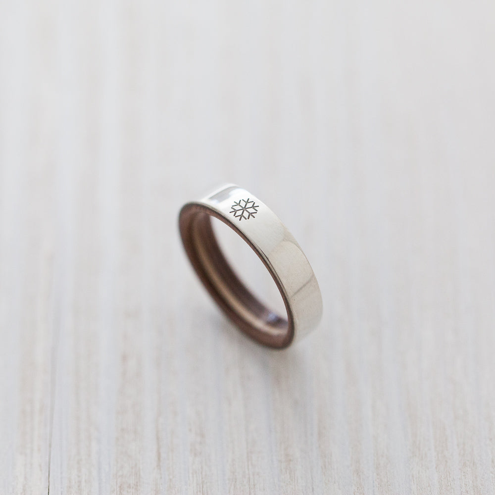 Snowflake engraving on silver & wooden skateboard ring - BoardThing