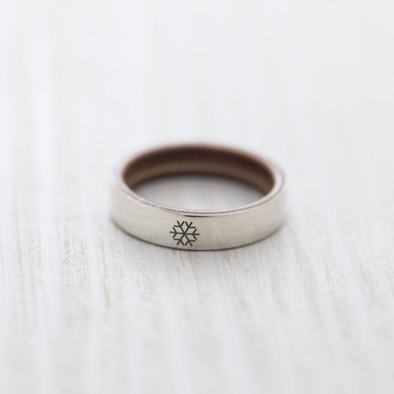 Snowflake engraving on silver & wooden skateboard ring - BoardThing