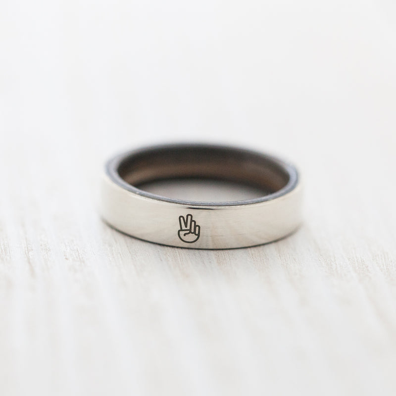 Peace engraving on silver & wood skateboard ring - BoardThing