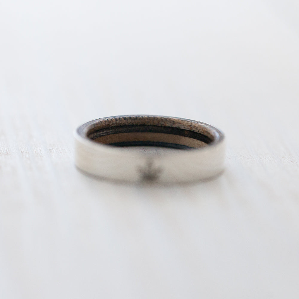 Ganja leaf engraving on silver & wood skateboard ring - BoardThing